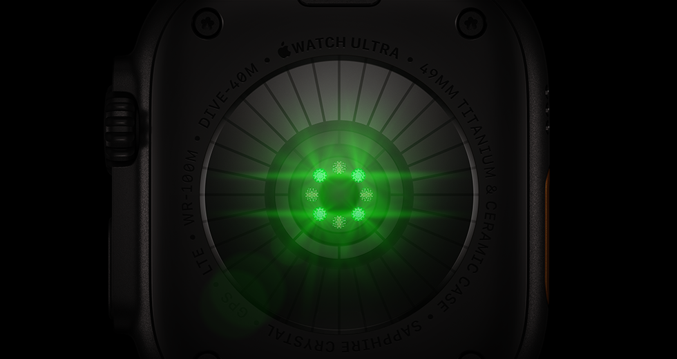 ด้านหลังของ Apple Watch Ultra 4, ตัวเรือนไทเทเนียม, สีดำ, เซ็นเซอร์ทรงกลมหลายตัวพร้อมแสง LED สีเขียว