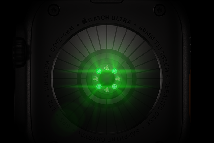 ด้านหลังของ Apple Watch Ultra 4, ตัวเรือนไทเทเนียม, สีดำ, เซ็นเซอร์ทรงกลมหลายตัวพร้อมแสง LED สีเขียว